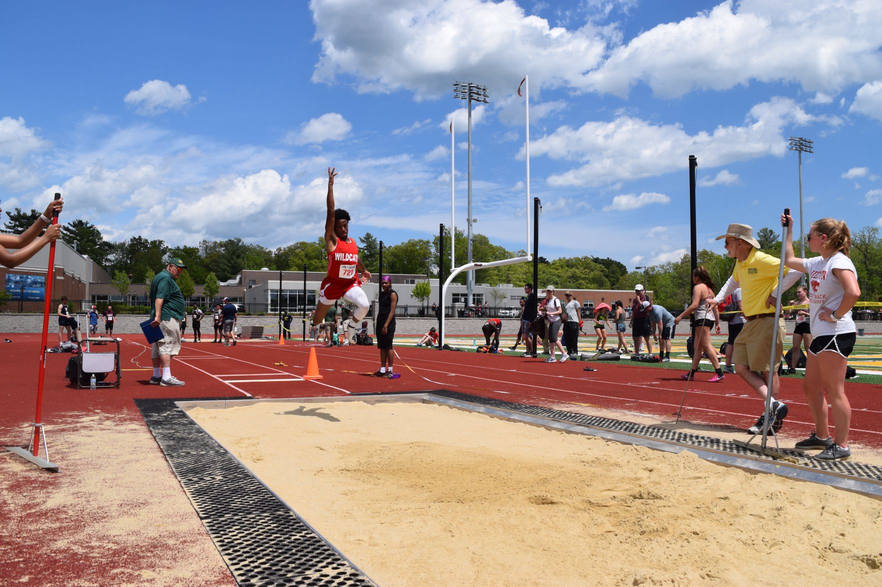 Woodley competes in long jump